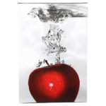 " Red Apple Splash " by Roderick Stevens